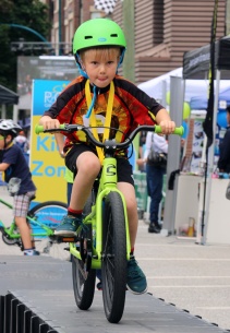 MARIO BARTEL PHOTO Aaron Paddon, 6, concentrates as he negotiates the trials course in the Kids Zone at Friday's PoCo Grand Prix.