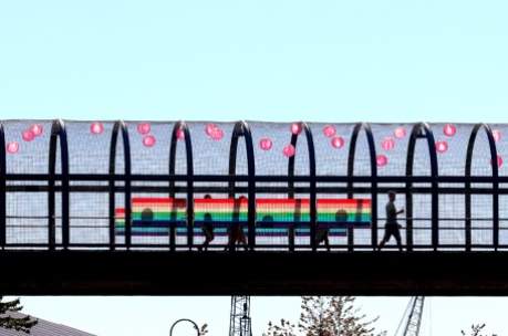 PHOTO BY MARIO BARTEL The pedestrian bridge at Hyack Square is appropriately decorated for Saturday's Pride street party.