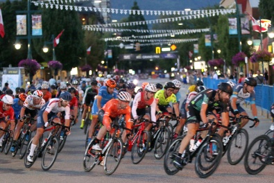 MARIO BARTEL/THE TRI-CITY NEWS The pro men's race speeds around the darkened streets of downtown Port Coquitlam at Friday's Poco Grand Prix.