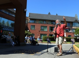 Chris Ridout teaches yoga and conducts a sing-a-long at Parkwood Manor in Coquitlam last Thursday. Photograph By MARIO BARTEL/THE TRI-CITY NEWS