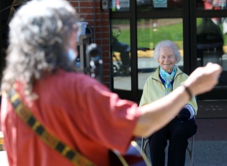Some of the seniors attending Chris Ridout's performane at Parkwood Manor in Coquitlam are more than 100 years old. Photo by MARIO BARTEL/THE TRI-CITY NEWS